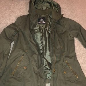green polo jacket